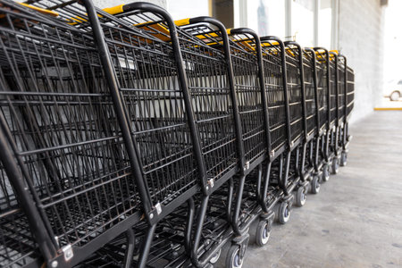 Shopping carts near supermarket, outdoors