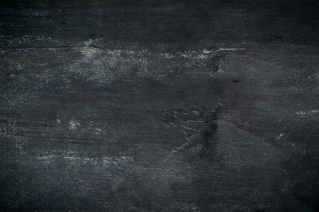 Black abstract wooden textured backgroundの写真素材