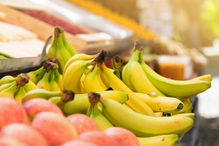 Bananas on sale at grocery market, shallow depthの写真素材
