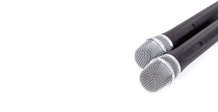 Cordless microphone closeup on white backgroundの写真素材