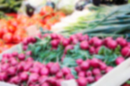 Fresh organic radish on farms market, vegetables on storage, nobody, blurred style out of focusの写真素材