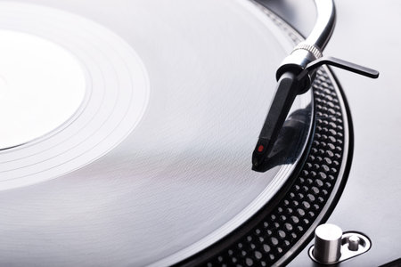 DJ headshell on spinning record, closeupの写真素材