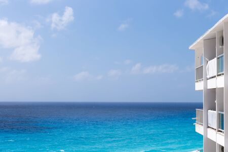 Luxury hotel with balcony, aerial view on caribbean seaの写真素材