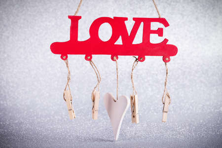 Valentines Day background. Wooden word LOVE on glitter bokeh with copyspace, nobodyの写真素材