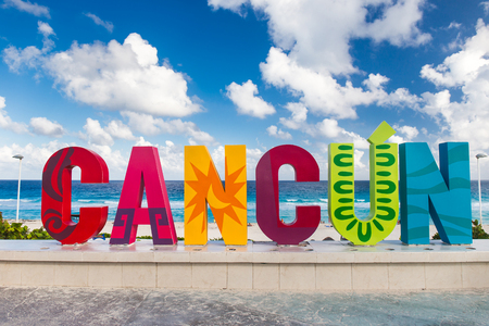 Cancun, Mexico - 12 December 2015: CANCUN inscription in front of the Playa Delfines beachのeditorial素材