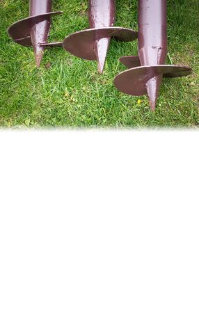 Stack of screw piles for house foundation, closeup. Nobody. Outdoors on construction site
の写真素材