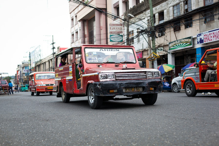 Ilo Ilo city, Philippines - 30 May 2013: Filipino taxi at the streetのeditorial素材
