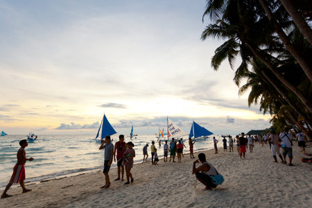 Philippines, Boracay Island - 21 May 2013: Sailing boats at Boracay sunset, Aklan Province