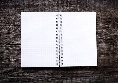 Notebook on wooden background. Nobody. Back to school