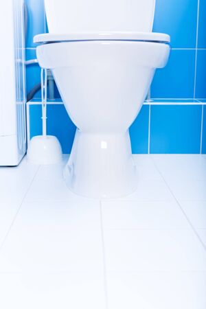 White toilet bowl in a bathroom with minimalism interior, nobody, copy spaceの写真素材