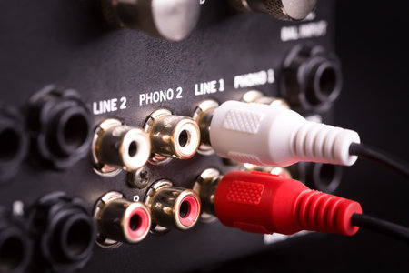 Inputs and outputs on back panel of dj mixer, closeup