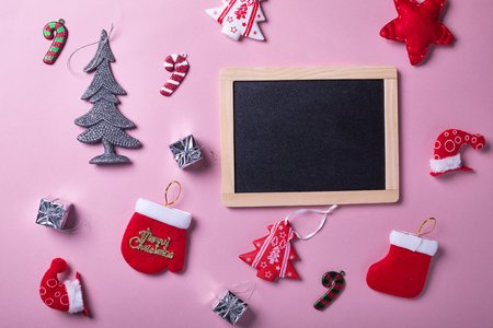 Christmas and new year objects on pink paper background, nobody. Winter holidays celebrationの写真素材