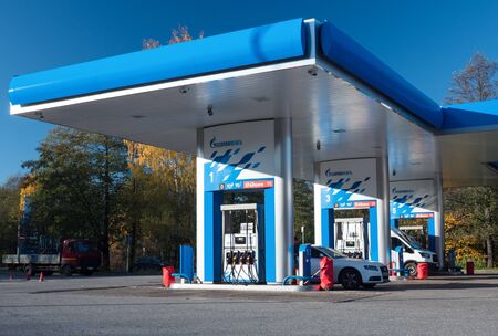 Russia, Saint-Petersburg - 15.10.2018: Gazprom Petrol station in sunny day. Its a large Russian fuel companyのeditorial素材