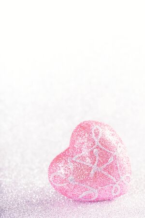 Valentines Day background. Heart shape on glitter bokeh with copyspace, nobodyの写真素材