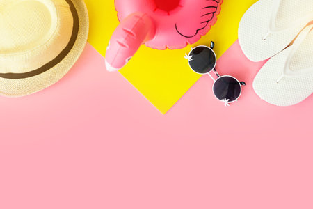 Summer travel concept. Vacation objects flat lay on creative color background, top view