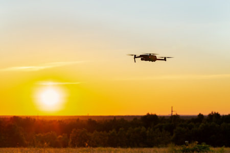 Drone flying on sky background