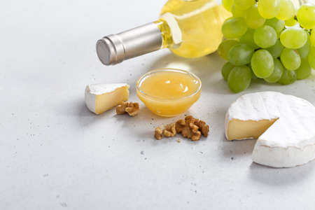 Camembert with cheese fork on white backround. Top viewの写真素材