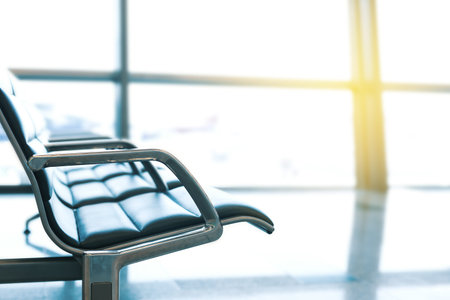 Empty seats at departure lounge, no people. International airport interior, nobodyの写真素材