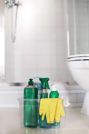 Cleaning detergent products with gloves in conteiner for room service in restroom. Sanitary equipment for disinfect homeの写真素材
