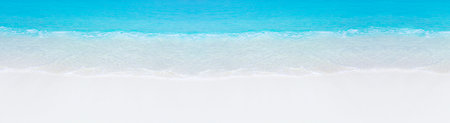 Tropical beach scene of azure crystal sea with soft waves, wild untouched seashore. Long banner