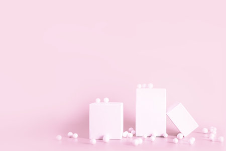 White empty stands on light color background. Blank podiums shopfront decorated bubbles. Showcase for cosmetic or beauty promotions. Product display advertisement. Copy space.の写真素材