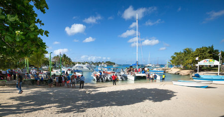 DOMINICAN REPUBLIC, BAYAHIBE - 4 APRIL 2019: People waiting boat to Saona Island at port. Famous tour in Punta Canaのeditorial素材