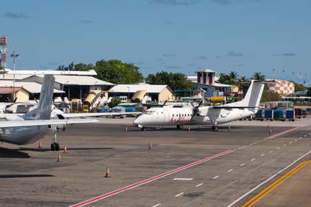 MALDIVES, MALE - 18 MARCH 2017: Velana international airport with Maldivian airplanes on runwayのeditorial素材
