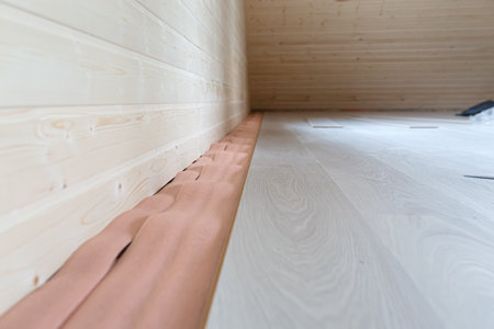 Installation of floating laminate inside room. Nobodyの写真素材