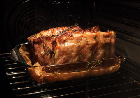 Cooking pork ribs inside oven. Closeupの写真素材