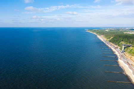 Summer Baltic Sea with embankment for promenade In Svetlogorsk. Kaliningrad region. Aerial panorama viewの写真素材