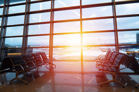 Empty seats at departure lounge, no people. International airport interior, nobodyのeditorial素材