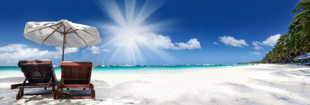 Sea view with chairs and parasol. Beach and ocean panoramic banner background. tourism conceptの写真素材