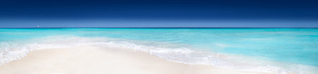 Panorama of Caribbean sea with surfing water waves, selective focus on white foam, panoramic header banner, copy space. travel vacation conceptの写真素材