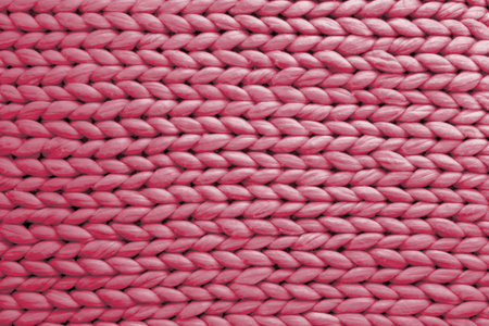 Texture background from merino knitted blanket, scandinavian minimalism backdrop with copy space, top view.. Viva Magenta color of the year 2023の写真素材