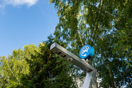 YANTARNY, RUSSIA - JUNE 27, 2021: Electric car charging in nature, electrofilling stations (EZS) for electric vehicles, ecology conceptのeditorial素材