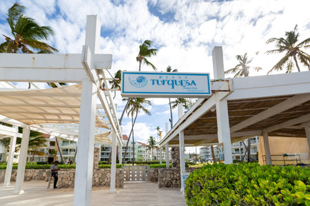PUNTA CANA, DOMINICAN REPUBLIC - March 22, 2022: Entrance view with sign board to luxury residence Playa Turquesa in Bavaroのeditorial素材
