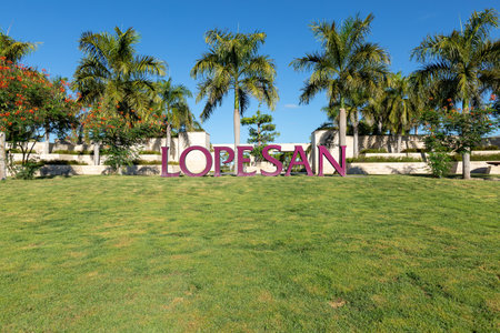 PUNTA CANA, DOMINICAN REPUBLIC - January 27, 2022: Entrance facade of Lopesan Costa Bavaro in Punta Cana. Resort, Spa and Casino. Traditional luxury caribbean gate and fence, decorated coconut palmsのeditorial素材