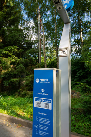 YANTARNY, RUSSIA - JUNE 27, 2021: Electric car charging in nature, electrofilling stations (EZS) for electric vehicles, ecology conceptのeditorial素材