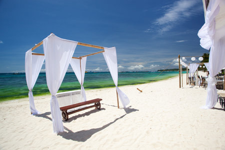 Wedding gate on tropical sandy beach near turquoise sea. Nobodyの写真素材