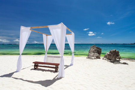 Wedding gate on tropical sandy beach near turquoise sea. Nobodyの写真素材