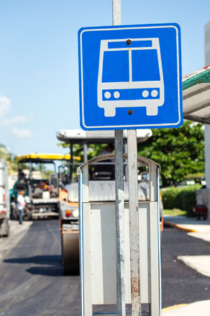 American road public bus stop sign on caribbean street road, nobodyの写真素材