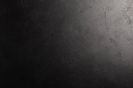 Black textured background. Copy space for designの写真素材