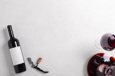 Decanter, glass and bottle with red wine on white background. Flat layの写真素材