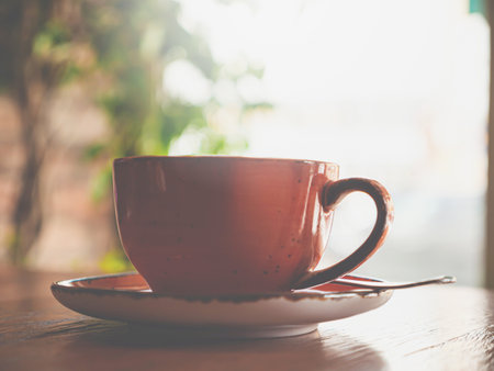 Cup of coffee on table in cafe infront of window. Closeup. Nobodyの写真素材