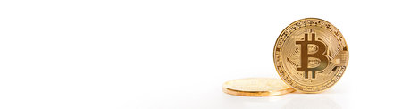Bitcoins closeup on white background. Long bannerの写真素材