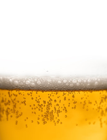 Beer with bubbles and foam in glass. Closeupの写真素材