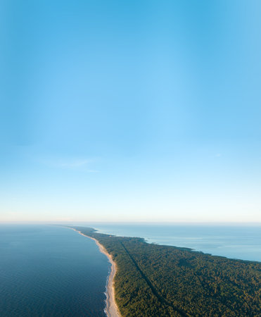 Curonian Spit wth Baltic sea coastline on sunset. Kurshskaya kosa national park near Zelenogradsk. Kaliningrad region. Aerial top viewの写真素材