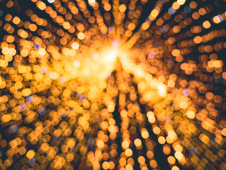 Blurred christmas tree with lights. Blur balls bokeh background. New year cardの写真素材