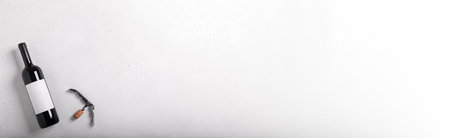 Decanter, glass and bottle with red wine on white background. Flat lay. Long bannerの写真素材
