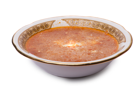classic Russian dish - borsch with sour cream on the plate. Isolated on white backgroundの写真素材